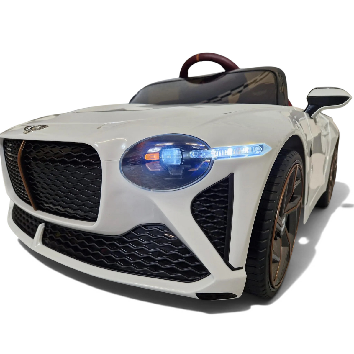 Voiture électrique enfant Petit Pilote Bentley Bacalar blanche avec phares LED allumés et calandre détaillée