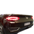 Vue arrière de la voiture électrique pour enfant Petit Pilote Bentley EXP 12V noire avec feux LED allumés