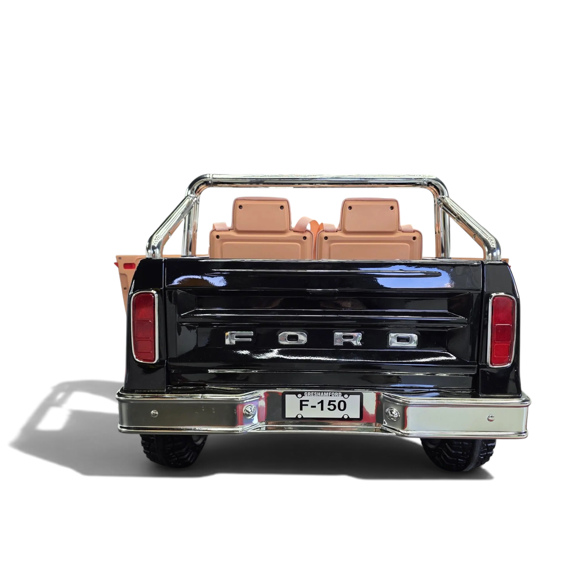 Vue arrière du pick-up électrique Odecare Ford F-150 noir métallisé pour enfants avec arceau chromé et sièges en cuir