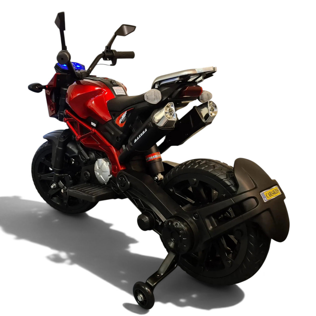 Moto électrique enfant Petit Pilote Grom Superbike rouge métallisé avec pneus EVA et phares, vue arrière trois-quarts