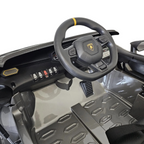 Intérieur de la voiture électrique enfant Petit Pilote Lamborghini Auténtica avec volant sport, siège cuir et pédale