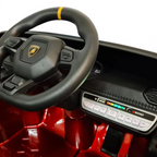Tableau de bord et volant de la voiture électrique enfant Petit Pilote Lamborghini Huracán rouge métallisé