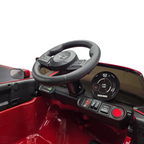 Intérieur de la voiture électrique pour enfant Petit Pilote Mini Cooper S rouge avec volant sport et tableau de bord