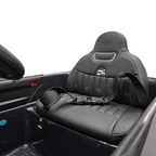 Siège en cuir noir avec ceinture de sécurité dans la voiture électrique pour enfant Petit Pilote Mini Cooper S