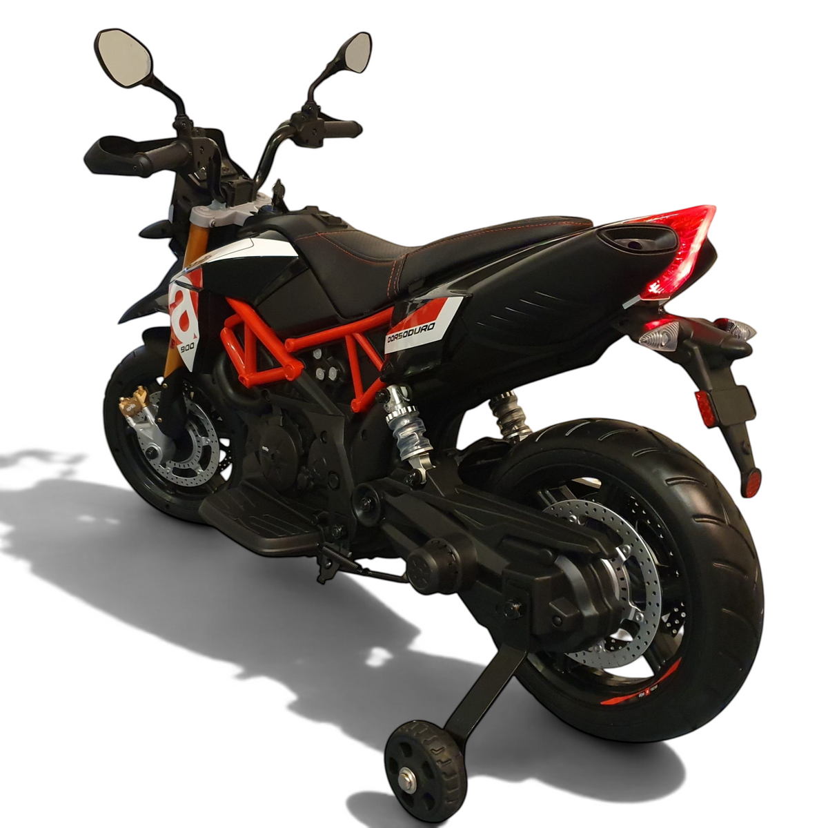 Moto électrique pour enfant Petit Pilote Aprilia Dorsoduro rouge et noire avec roulettes latérales et pneus EVA