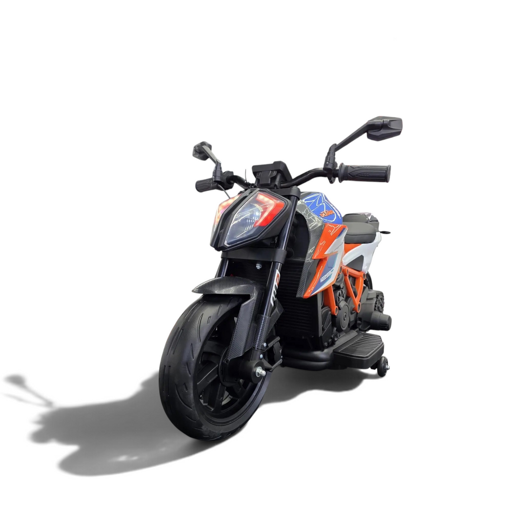 Moto électrique enfant Petit Pilote KTM 1290 Superduke rouge et orange avec phares LED et roulettes de stabilisation