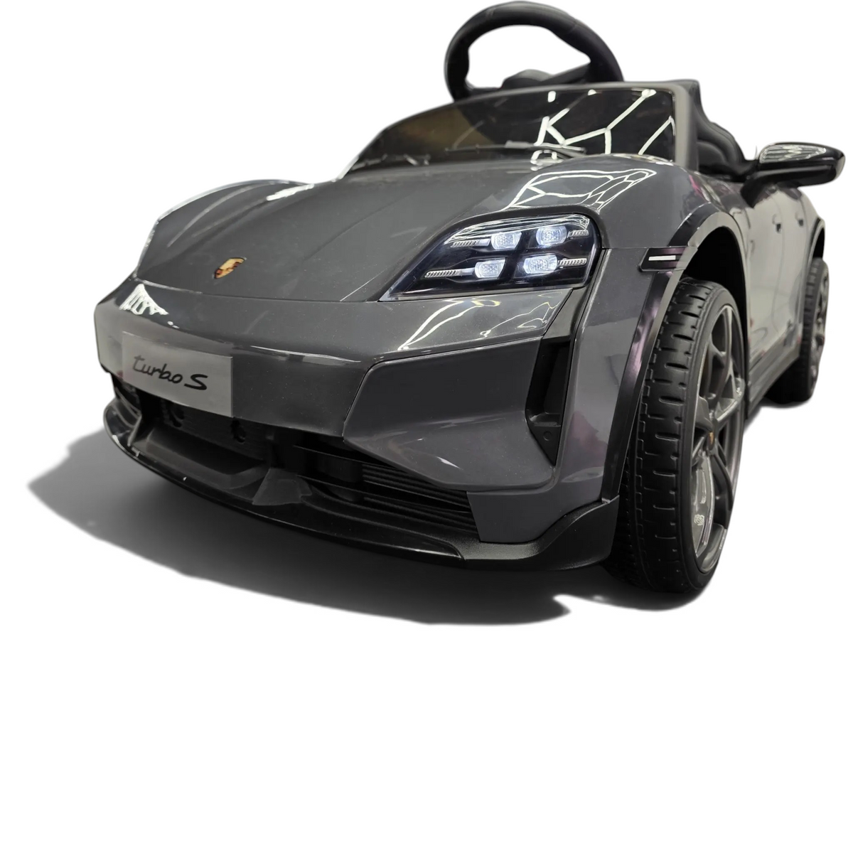 Voiture électrique pour enfant Petit Pilote Porsche Taycan grise avec phares LED et détails réalistes