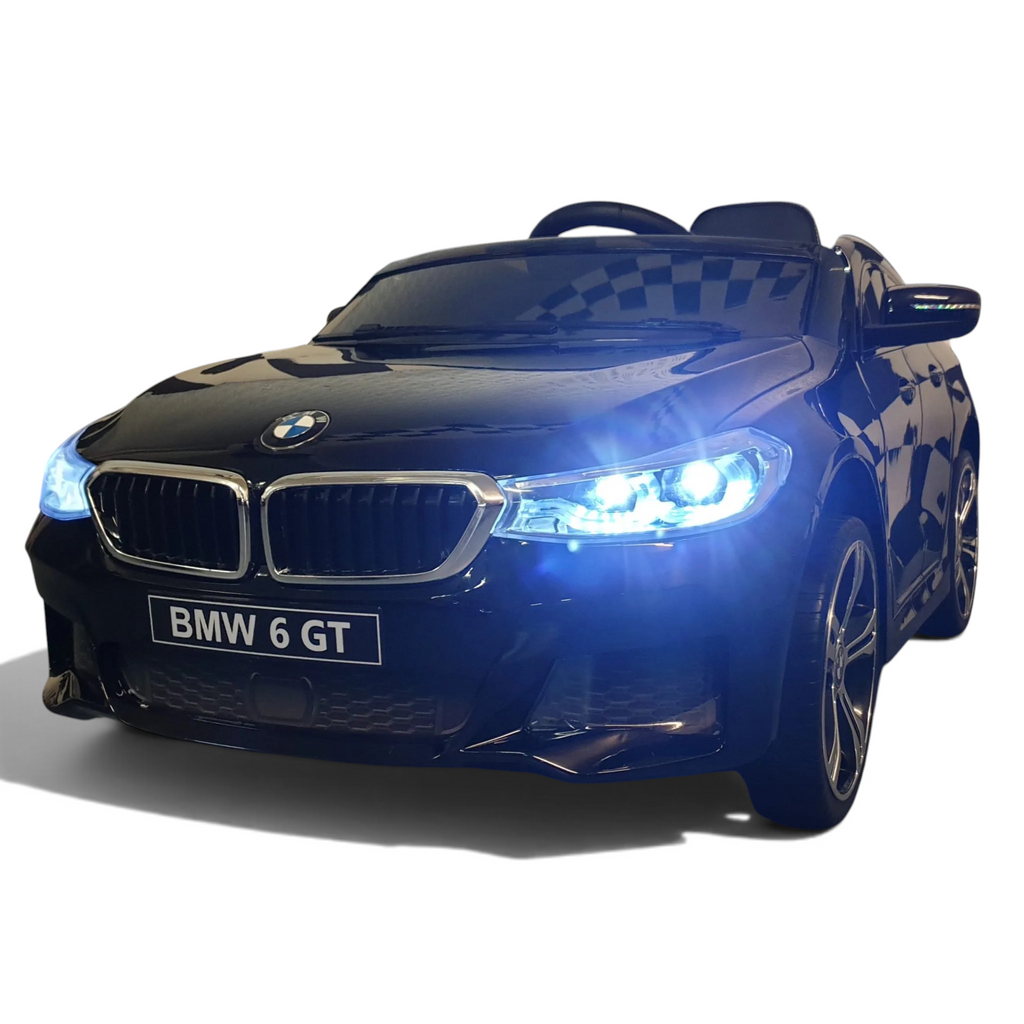 Voiture électrique enfant Petit Pilote BMW GT noire métallisée avec phares LED allumés et design réaliste