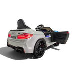 Voiture électrique enfant Odecare BMW M5 24V gris métallisé avec siège en cuir, pneus EVA et phares LED allumés