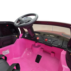 Intérieur rose de la voiture électrique enfant Dodge RAM 12V Petit Pilote avec volant, tableau de bord et siège en cuir