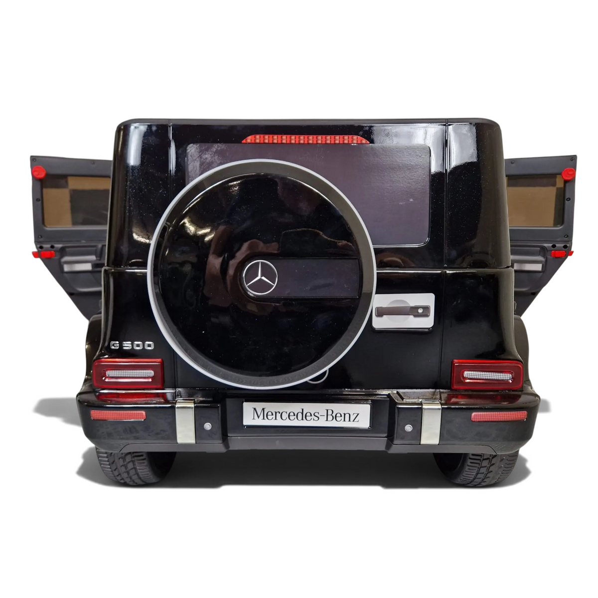 Vue arrière de la voiture électrique pour enfant Petit Pilote Mercedes G500 noire métallisée avec roue de secours