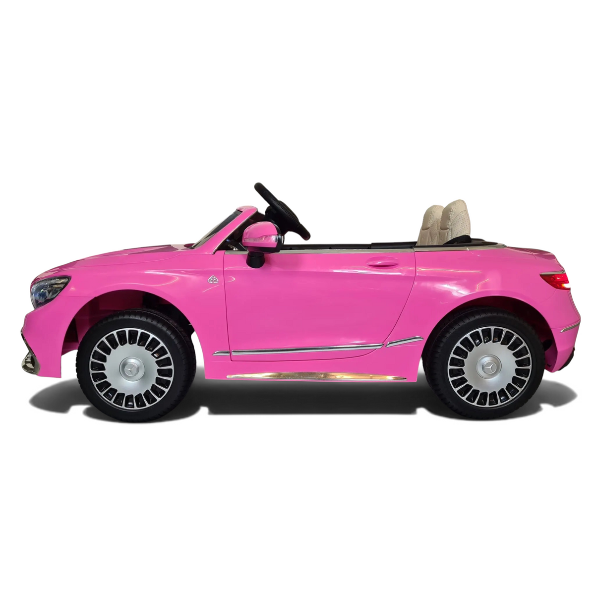 Voiture électrique enfant Odecare Mercedes S650 rose avec siège en cuir et pneus en caoutchouc, vue de profil