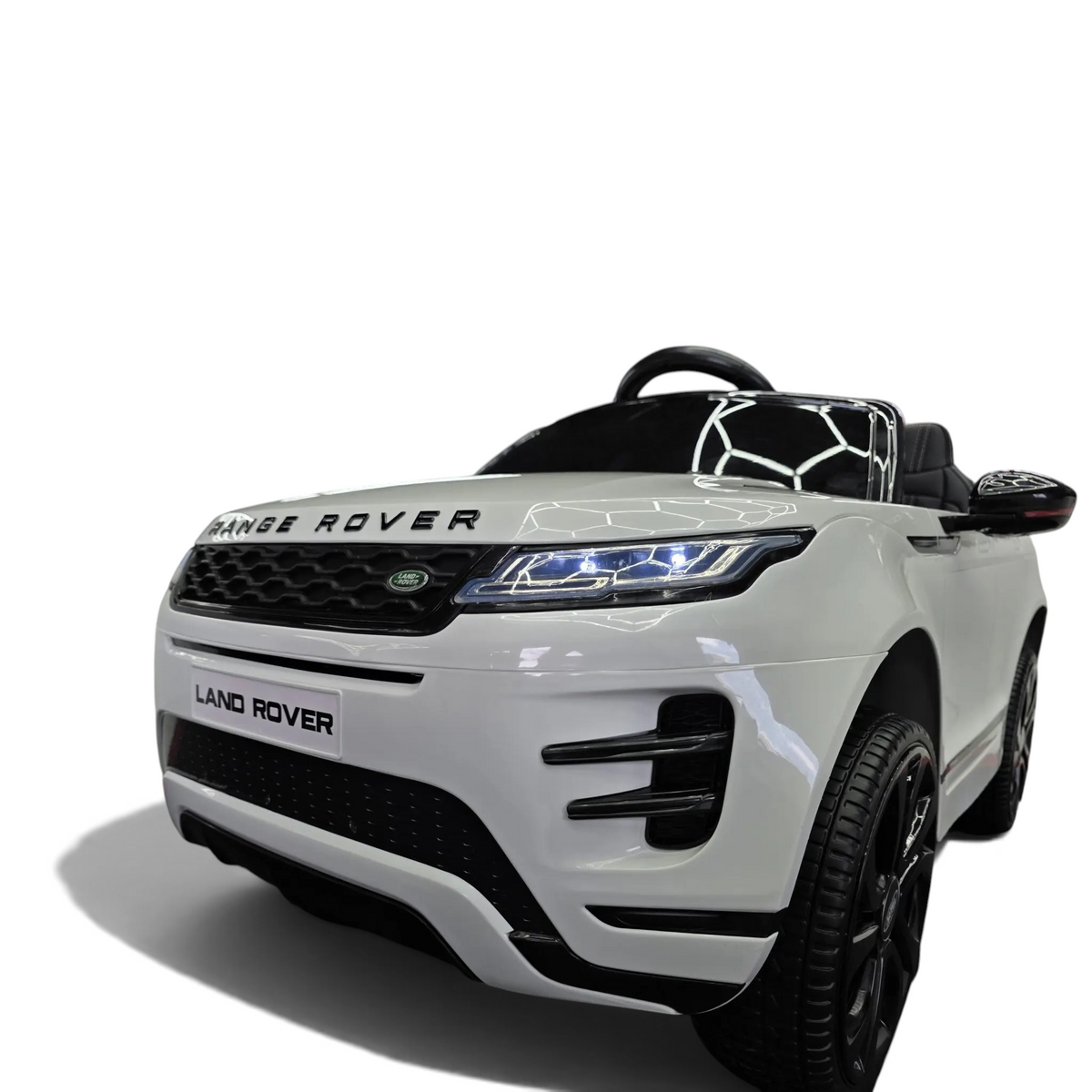 Voiture électrique pour enfant Petit Pilote Range Rover Evoque blanche avec phares LED fonctionnels et détails réalistes