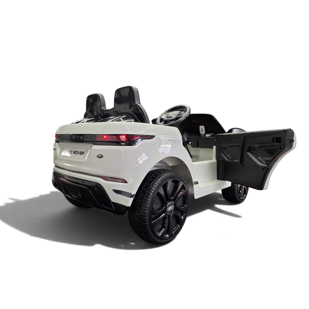 Voiture électrique enfant Petit Pilote Range Rover Evoque blanche avec porte ouverte, pneus caoutchouc et siège cuir