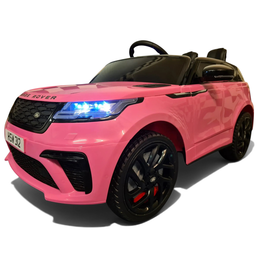 Voiture électrique pour enfant Petit Pilote Range Rover Velar rose avec phares LED allumés et pneus en caoutchouc noir