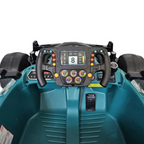 Vue intérieure du cockpit de la voiture électrique Petit Pilote Aston Martin F1 verte avec volant multifonction et écran