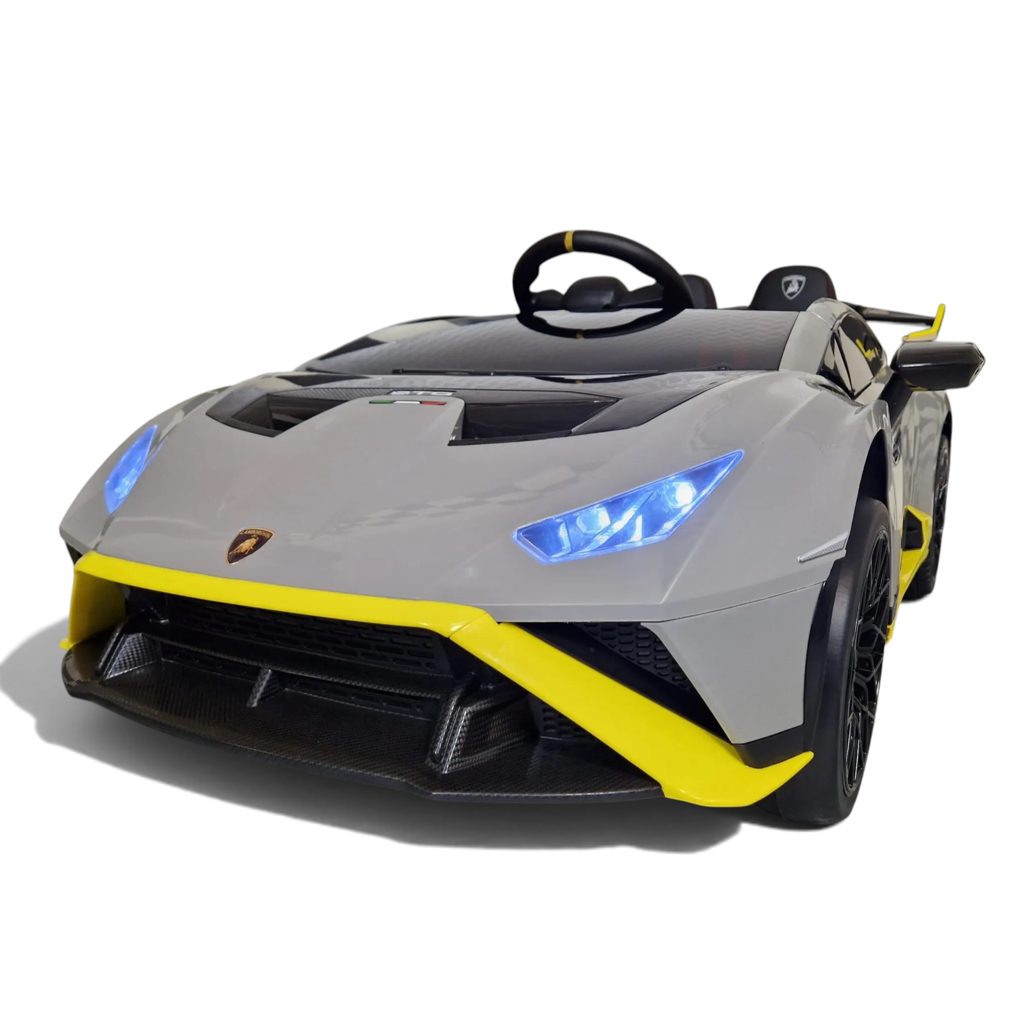 Voiture électrique enfant Petit Pilote Lamborghini Huracán STO grise avec détails jaunes et phares LED bleus allumés
