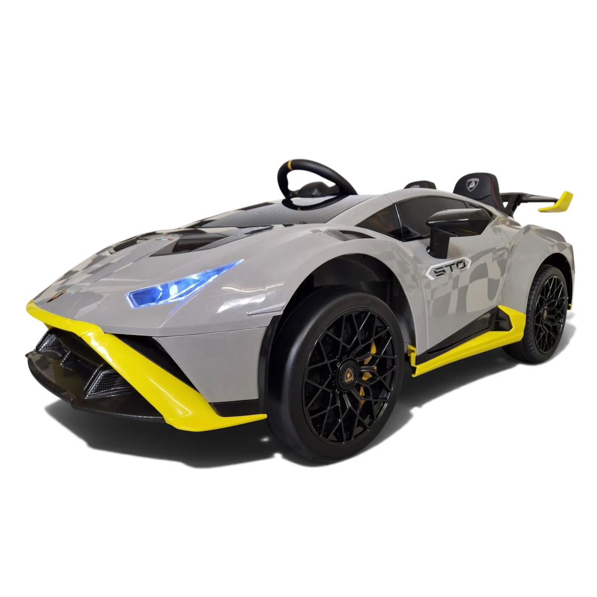 Voiture électrique enfant Petit Pilote Lamborghini Huracán STO grise avec détails jaunes, phares LED et siège en cuir