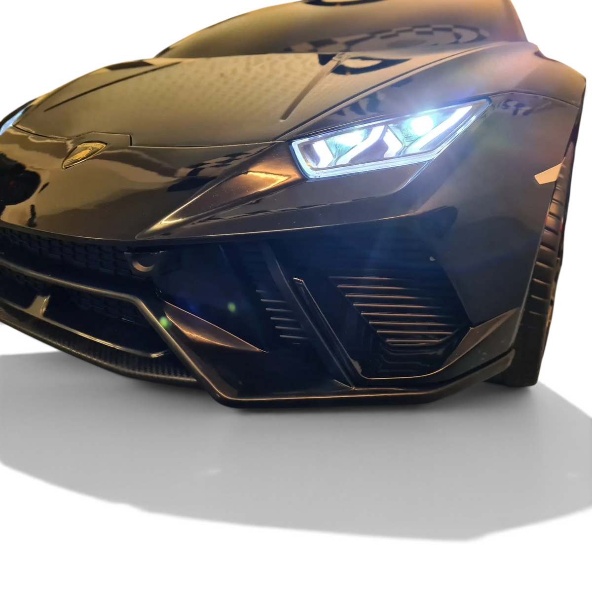 Voiture électrique pour enfant Petit Pilote Lamborghini Huracán noire métallisée avec phares LED allumés