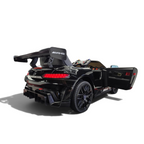 Voiture électrique enfant Petit Pilote Mercedes AMG GT3 noire métallisée avec aileron arrière et portes ouvrantes