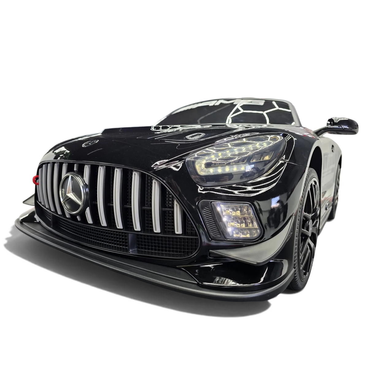 Voiture électrique enfant Petit Pilote Mercedes AMG GT3 noire métallisée avec phares LED et calandre sportive