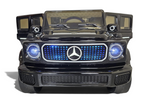 Voiture électrique enfant Petit Pilote Mercedes EQG noire avec phares LED allumés et calandre lumineuse