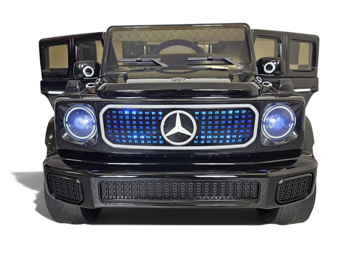 Voiture électrique enfant Odecare Mercedes EQG noire avec phares LED allumés et calandre lumineuse