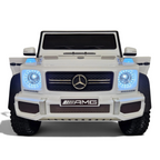 Voiture électrique enfant Petit Pilote Mercedes G63 AMG 6x6 blanche avec phares LED allumés et calandre emblématique
