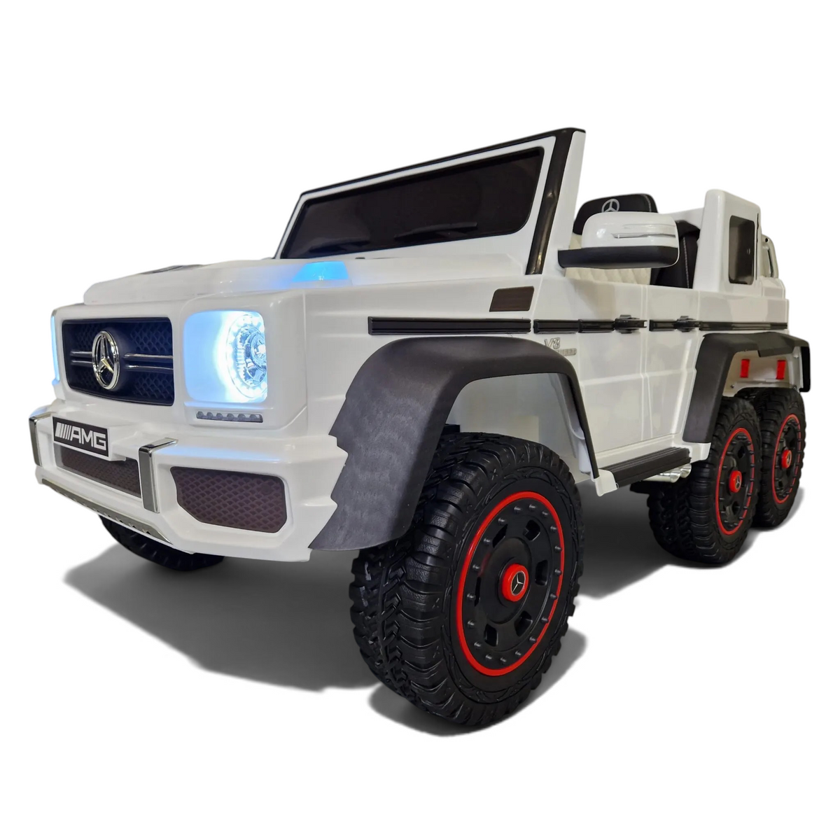 Voiture électrique enfant Odecare Mercedes G63 AMG 6x6 blanche avec phares LED et pneus EVA tout-terrain